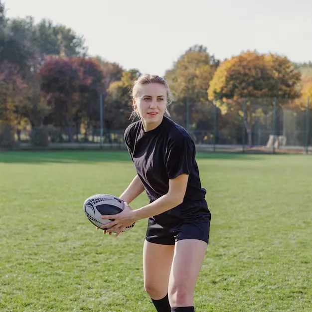 blonde-woman-preparing-throw-rugby-ball_23-2148355413_X8AU
